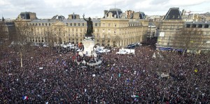 Thousands of people gather at Republique Square in Paris, Sunday, Jan. 11, 2015.  Thousands of people began filling France’s iconic Republique plaza, and world leaders converged on Paris in a rally of defiance and sorrow on Sunday to honor the 17 victims of three days of bloodshed that left France on alert for more violence. Credit: AP Photo
