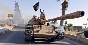 Islamic State of Iraq and the Levant fighters during a military parade in Raqqa province in Syria June 30, 2014 shown in propaganda photos released by the militants. Credit: © Alamy Images