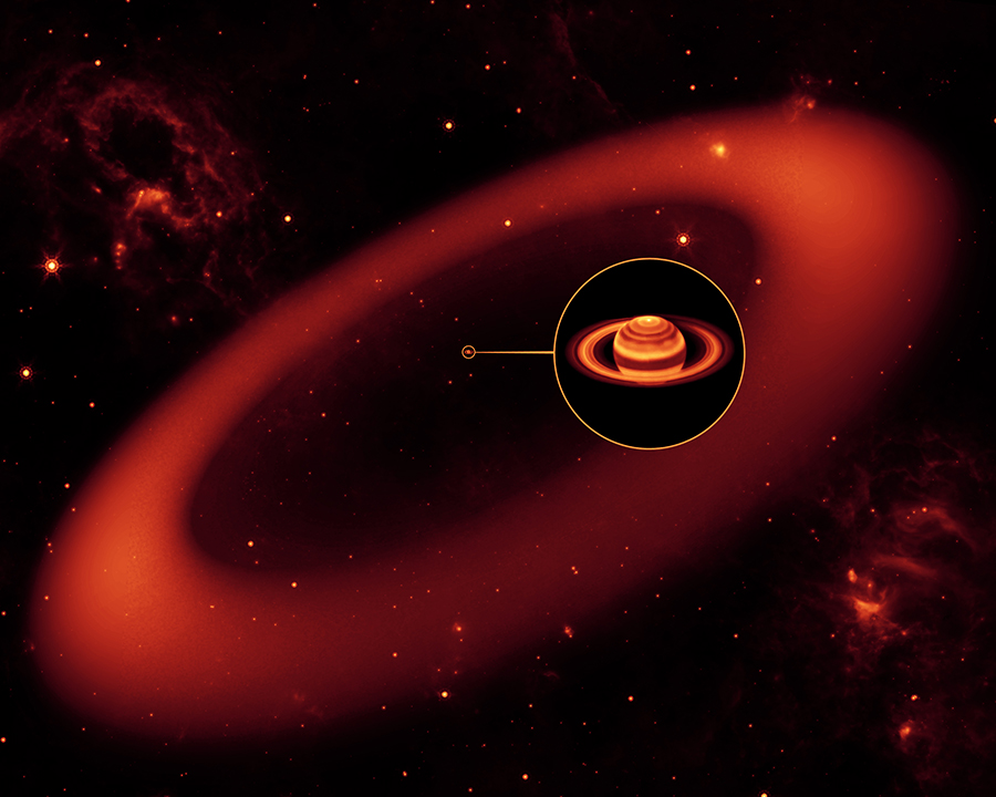 This artist's conception shows a nearly invisible ring around Saturn -- the largest of the giant planet's many rings. It was discovered by NASA's Spitzer Space Telescope. The artist's conception simulates an infrared view of the giant ring. Saturn appears as just a small dot from outside the band of ice and dust. The bulk of the ring material starts about six million kilometers (3.7 million miles) away from the planet and extends outward roughly another 12 million kilometers (7.4 million miles). The ring's diameter is equivalent to roughly 300 Saturns lined up side to side. The inset shows an enlarged image of Saturn, as seen by the W.M. Keck Observatory at Mauna Kea, Hawaii, in infrared light. The ring, stars and wispy clouds are an artist's representation. (Credit: NASA/JPL-Caltech/Keck)