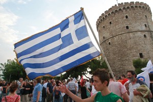 GREECE, Thessaloniki JULY 10, 2015: Anti-austerity demonstrators, members of various left wing parties, protest against new austerity measures while demanding Greece to get out of the European Union. The White Tower of Thessaloniki can be seen in background. Credit: © Yiorgos GR/Shutterstock