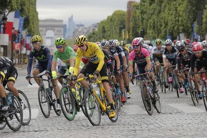 British cyclist Chris Froome, wearing the leader's yellow jersey, and Peter Sagan of Slovakia, in green, ride down the Champs-Élysées in the final stage of the Tour de France during the twenty-first and last stage of the Tour de France cycling race over 109.5 kilometers (68 miles) with start in Sevres and finish in Paris The pack with Britain's Chris Froome, wearing the overall leader's yellow jersey, and Peter Sagan of Slovakia, wearing the best sprinter's green jersey, ride down the Champs Elysees avenue during the twenty-first and last stage of the Tour de France cycling race over 109.5 kilometers (68 miles) with start in Sevres and finish in Paris, France, Sunday, July 26, 2015. Credit: © Christophe Ena, AP Photo