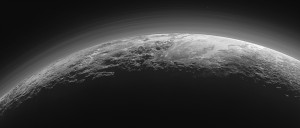 Pluto’s Majestic Mountains, Frozen Plains and Foggy Hazes: Just 15 minutes after its closest approach to Pluto on July 14, 2015, NASA’s New Horizons spacecraft looked back toward the sun and captured this near-sunset view of the rugged, icy mountains and flat ice plains extending to Pluto’s horizon. The smooth expanse of the informally named icy plain Sputnik Planum (right) is flanked to the west (left) by rugged mountains up to 11,000 feet (3,500 meters) high, including the informally named Norgay Montes in the foreground and Hillary Montes on the skyline. To the right, east of Sputnik, rougher terrain is cut by apparent glaciers. The backlighting highlights over a dozen layers of haze in Pluto’s tenuous but distended atmosphere. The image was taken from a distance of 11,000 miles (18,000 kilometers) to Pluto; the scene is 780 miles (1,250 kilometers) wide. Credit: NASA/JHUAPL/SwRI