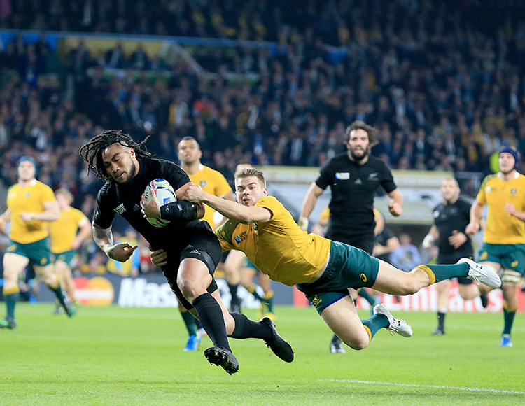 Ma'a Nonu beats the diving tackle of Drew Mitchell to score the 2nd Try for New Zealand. Credit: © Rex Features/AP Photo