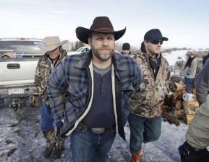 Ammon Bundy, one of the sons of Nevada rancher Cliven Bundy, arrives for a news conference at Malheur National Wildlife Refuge near Burns, Ore., on Wednesday, Jan. 6, 2016. With the takeover entering its fourth day Wednesday, authorities had not removed the group of roughly 20 people from the Malheur National Wildlife Refuge in eastern Oregon's high desert country. Credit: © Rick Bowmer, AP Photo