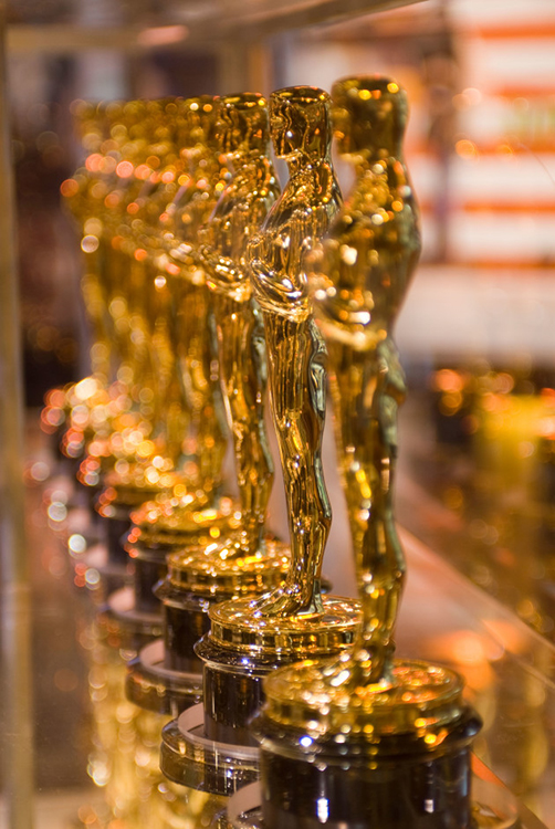 Academy Awards are presented annually for outstanding achievements in filmmaking. Winners of an Academy Award receive a gold-plated statue commonly called an Oscar, shown here. Credit: © Richard Levine, Alamy Images