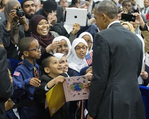 President Barack Obama stops to greets children from Al-Rahmah school and other guests during his visit to the Islamic Society of Baltimore, Wednesday, Feb. 3, 2016, in Baltimore, Md. Obama is making his first visit to a U.S. mosque at a time Muslim-Americans say they're confronting increasing levels of bias in speech and deeds.Credit: © Pablo Martinez Monsivais, AP Photo