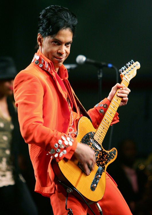 Prince performs during the Super Bowl XLI halftime at the Miami Beach Convention Center on February 1, 2007 in Miami, Florida. Credit: © Jed Jacobsohn, Getty Images