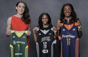 Breanna Stewart (left), Moriah Jefferson (center), and Morgan Tuck pose with the WNBA jerseys they will be wearing when the season starts next month. The University of Connecticut teammates were the top three picks in the 2016 WNBA Draft. Credit: © 2016 NBAE (Photo by Steven Freeman, NBAE/Getty Images)