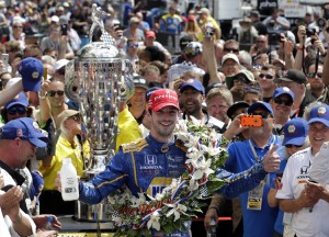 Alexander Rossi celebrates after winning the 100th running of the Indianapolis 500 auto race at Indianapolis Motor Speedway in Indianapolis, Sunday, May 29, 2016. Credit: © Darron Cummings, AP Photo