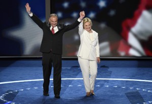 Democratic presidential nominee Hillary Clinton and her vice presidential running mate Tim Kaine wave to the crowd at the Democratic National Convention in Philadelphia, Pennsylvania, on July 28, 2016. Credit: Ida Mae Astute, ABC (licensed under CC BY-ND 2.0)