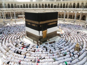 Kaaba the Holy mosque in Mecca with Muslim people pilgrims of Hajj praying. Credit: © Shutterstock
