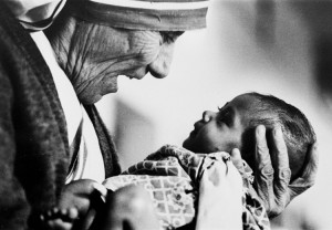 Mother Teresa, head of the Missionaries of Charity order, cradles an armless baby girl at her order's orphanage in Calcutta, India in 1978.  A champion among the poor in India, Mother Teresa received the Nobel Peace Prize Oct. 17, 1979.  An Albanian, she went to India in 1928 to teach at a convent school, taking her final vows as a Roman Catholic nun in 1937, and opened her House for the Dying in 1952. Mother Teresa's devotion to the destitute children of Calcutta, lepers and other unfortunates of the world  set a new standard of compassion for humanity.  She died Sept. 5, 1997, at the age of 87. Credit: © AP Photo