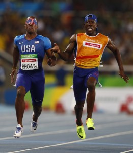 David Brown of the United States wins the gold medal in the 2016 Rio Paralympics event with his guide Jerome Avery (R). Credit: © Jason Cairnduff, Reuters