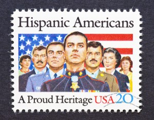 A postage stamp printed in USA showing an image of seven proud Hispanic Americans marines, soldiers and veterans, circa 1984. Credit: © Shutterstock 