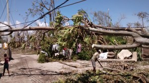 On Oct. 7, 2016, people in Les Cayes, Haiti, search through the wreckage left by Hurricane Matthew days earlier. Credit: Julien Mulliez, UK Department for International Development (licensed under CC BY 2.0)