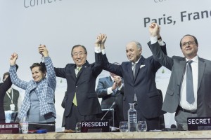 Secretary-General Ban Ki-moon (second left); Christiana Figueres (left), Executive Secretary of the UN Framework Convention on Climate Change (UNFCCC); Laurent Fabius (second right), Minister for Foreign Affairs of France and President of the UN Climate Change Conference in Paris (COP21) and François Hollande (right), President of France celebrate after the historic adoption of Paris Agreement on climate change. Credit: © Mark Garten, UN Photo