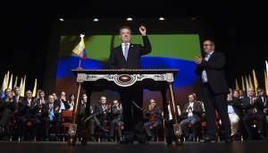 On Nov. 24, 2016, Colombian President Juan Manuel Santos prepares to sign a peace agreement ending decades of conflict with the Revolutionary Armed Forces of Colombia (FARC). The signing ceremony took place at the Teatro Colón in Bogotá, the capital. Credit: © César Carrión, GIS (Government Information System)