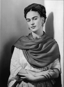 Portrait of Mexican painter Frida Kahlo (1907 - 1954) as she leans against a wall with her arms crossed and a shawl over her shoulders, 1941. Credit: © Hulton Archive/Getty Images