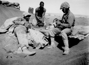 Iwo Jima...Negro Marines on the beach at Iwo Jima are, from left to right, Pfcs. Willie J. Kanody, Elif Hill, and John Alexander." March 1945. Credit: National Archives