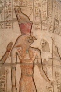 Painted relief carving depicting the falcon headed god Horus wearing the double crown of Egypt, Kom Ombo Temple, Egypt. Credit: © Gary Cook, Alamy Images