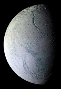 Enceladus, a satellite of Saturn, has active geysers that spout water ice. The moon's icy surface, seen in a Cassini probe image, is continually smoothed by this activity and shows few craters. Credit: NASA/JPL/Space Science Institute