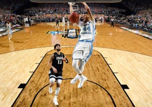 Justin Jackson #44 of the North Carolina Tar Heels dunks late in the second half against Josh Perkins #13 of the Gonzaga Bulldogs during the 2017 NCAA Men's Final Four National Championship game at University of Phoenix Stadium on April 3, 2017 in Glendale, Arizona. Credit: © Chris Steppig, Getty Images