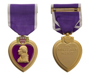 The front and back of a modern US Purple Heart medal. Credit: © Gary Blakeley, Shutterstock
