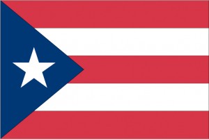 The Puerto Rican flag, first flown in 1895, became the commonwealth's official flag in 1952. Credit: © Dream Maker Software