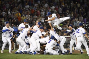 The University of Florida players celebrate and form a dog pile after defeating Louisiana State University 6-1 in the Division I Men's Baseball Championship held at TD Ameritrade Park on June 27, 2017 in Omaha, Nebraska. Credit: © Jamie Schwaberow, NCAA/Getty Images