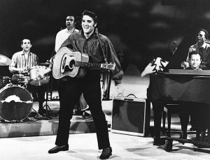 Elvis Presley rehearses for a 1956 appearance on "The Ed Sullivan Show." Presley's appearance on the TV show helped establish him as a national celebrity. Credit: UPI/Corbis-Bettman