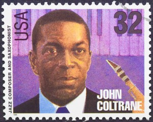 A postage stamp printed in USA showing an image of John Coltrane, circa 1995. Credit: © Shutterstock