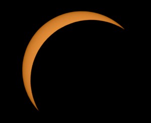 The Moon is seen passing in front of the Sun during a solar eclipse from Ross Lake, Northern Cascades National Park, Washington on Monday, Aug. 21, 2017. A total solar eclipse swept across a narrow portion of the contiguous United States from Lincoln Beach, Oregon to Charleston, South Carolina. A partial solar eclipse was visible across the entire North American continent along with parts of South America, Africa, and Europe. Credit: Bill Ingalls, NASA