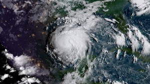 On Aug. 24, the National Hurricane Center noted that Hurricane Harvey was quickly strengthening and is forecast to be a category 3 Hurricane when it approaches the middle Texas coast. In addition, life-threatening storm surge and freshwater flooding expected. GOES-16 captured this geocolor image of Tropical Storm Harvey in the Gulf of Mexico this morning, August 24, 2017. Geocolor imagery enhancement shown here displays geostationary satellite data in different ways depending on whether it is day or night. This image, captured as daylight moves into the area, offers a blend of both, with nighttime features on the left side of the image and daytime on the right. Credit: NOAA/NASA GOES Project