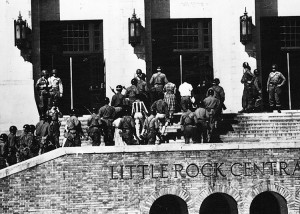 A civil rights law banning compulsory school segregation led to a dramatic incident in 1957. President Eisenhower sent troops to escort black students into an all-white Arkansas school. Credit: © United Press Int. 