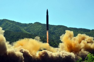 This picture taken on July 4, 2017 and released by North Korea's official Korean Central News Agency (KCNA) on July 5, 2017 shows the successful test-fire of the intercontinental ballistic missile Hwasong-14 at an undisclosed location. South Korea and the United States fired off missiles on July 5 simulating a precision strike against North Korea's leadership, in response to a landmark ICBM test described by Kim Jong-Un as a gift to "American bastards". Credit: © STR/AFP/Getty Images