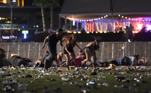 People run from the Route 91 Harvest country music festival after apparent gun fire was heard on October 1, 2017 in Las Vegas, Nevada. There are reports of an active shooter around the Mandalay Bay Resort and Casino. Credit: © David Becker, Getty Images