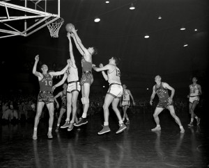 18 Apr 1951-Arnie Risen, second from right, of the Rochester Royals nabs a rebound from Harry Gallatin (11) of the New York Knickerbockers in the sixth game of the NBA Championship Playoff in New York's 69th Regiment Armory, . Other players are, Jack Coleman (10) of the Royals and Vince Boryla (12) of the Knocks. Credit: © Marty Zimmerman, AP/REX/Shutterstock
