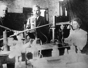 The husband-and-wife team of Pierre and Marie Curie, shown here, with help from the French chemist Gustave Bémont, isolated the radioactive element radium in 1898. Credit: © AP Images