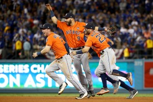 Alex Bregman #2, Marwin González #9, Carlos Correa #1, and José Altuve #27 of the Houston Astros celebrate defeating the Los Angeles Dodgers 5-1 in game seven to win the 2017 World Series at Dodger Stadium on November 1, 2017 in Los Angeles, California. Credit: © Ezra Shaw, Getty Images