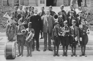 Father Flanagan, founder & director of Boys Town settlement, standing next to US Pres. Calvin Coolidge on steps of summer WH while surrounded by Boys Town Band. Credit: © Aral/Pix Inc./The LIFE Images Collection/Getty Images