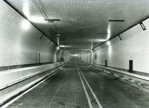 Lincoln Tunnel - South Tube - Interior of the practically-completed tube, with temporary lighting cables still in place. October 28, 1937. Credit: The Port Authority of New York
