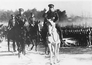 Emperor Hirohito, on the white horse, reviewed Japanese troops in 1938. Japan's military had become increasingly powerful during the 1930's. By 1936, military leaders held firm control of Japan's government. Credit: © AP Photo