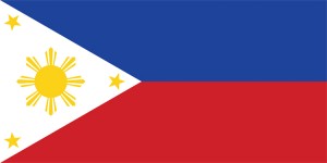 The flag of the Philippines has a blue stripe on top representing patriotism and a red stripe at the bottom representing courage. The white triangle along the flagpole side stands for peace. Within the triangle is a sun, symbolizing independence, and a gold star for each of the country’s three main island groups. The flag’s design dates back to the Philippine struggle for independence in the 1890’s. Credit: © Loveshop/Shutterstock