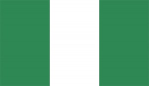 The flag of Nigeria has three vertical stripes. The center stripe is white, representing unity and peace. The two outer stripes are green, representing agriculture. In 1959, as Nigeria moved toward independence, a national planning committee held a contest to design a national flag. The winning idea came from Michael Taiwo Akinkunmi, a student from the city of Ibadan. Credit: © Loveshop/Shutterstock