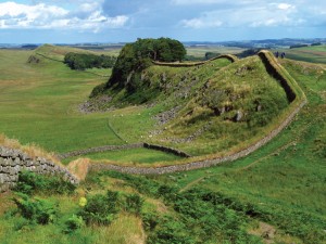 Hadrian's Wall, built by the Romans in the A.D. 120's, protected England from northern raiders. It extended from Solway Firth to the North Sea. Parts of the wall, such as that shown in this photograph, still stand. Credit: © Thinkstock