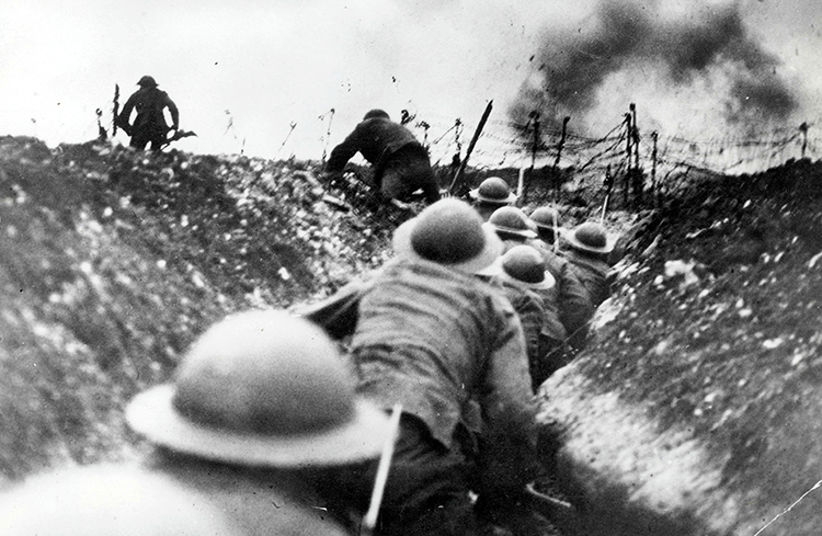 British troops go "over the top" during the Battle of the Somme in northern France. The battle took place during the summer and autumn of 1916. It was one of the longest and bloodiest campaigns of World War I (1914-1918). Credit: © Paul Popper, Popperfoto/Getty Images