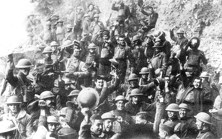 Men of U.S. 64th Regiment, 7th Infantry Division, celebrate the news of the Armistice, November 11, 1918. Credit: U.S. Army
