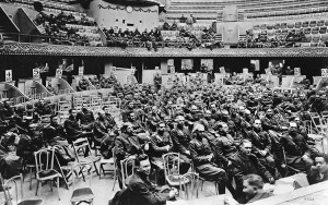 First organizational meeting of the American Legion in Paris, France. Caucus was held March 15,16,17 1919 and convened by members of the American Expeditionary Force (AEF). Writing in pencil on back of the photo reads, "Spring 1919 Cirque de Paris First [illegible] Legion Convention 3-day organization meeting." Credit: Harry S. Truman Library & Museum