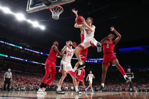 Kyle Guy #5 of the Virginia Cavaliers attempts a shot against the Texas Tech Red Raiders in the first half during the 2019 NCAA men's Final Four National Championship game at U.S. Bank Stadium on April 08, 2019 in Minneapolis, Minnesota.  Credit: © Tom Pennington, Getty Images