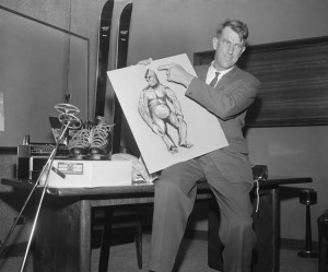 New Zealand mountain climber Sir Edmund Hillary shows an artist's illustration of the legendary Yeti. Hillary hoped to discover proof of the Yeti's existence on a 1960 expedition to the Himalayas sponsored by World Book. Credit: © Bettmann/Getty Images 